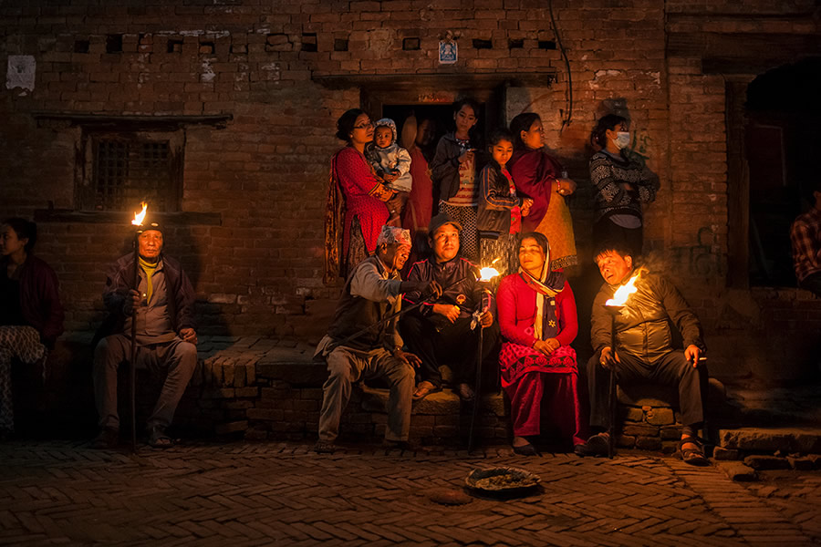A family performing Mashal Yatra at Thimi